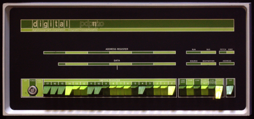 Image of a green front panel from a PDP-11